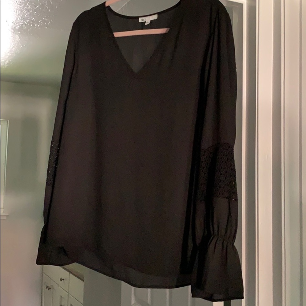Black long sleeve blouse with detailing on sleeves